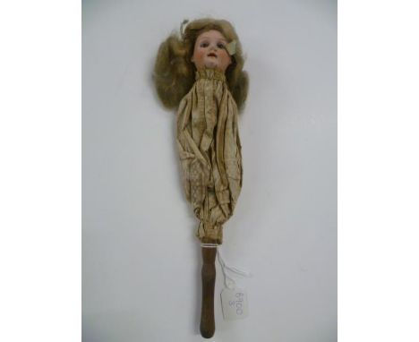 Early 20th century Schoenau & Hoffmeister Bisque Headed Marotte Doll on Turned Wooden Stick with brown eyes and open mouth, i