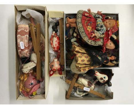 Three boxed Pelham Puppets including Foal, Giraffe and Fitzl plus a quantity of vintage tourist dolls