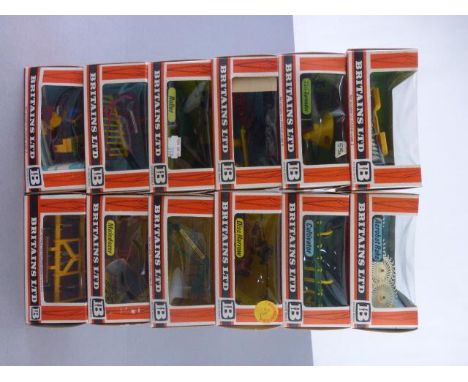Twelve boxed Britains Farm Implements comprising of 9536 Cultivator, 9553 Disc Harrow, 9538 Vari-Spreader, 9534 Disc Harrow, 