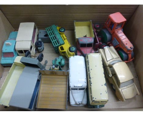 12 Vintage ply worn Dinky die-cast vehicles featuring 27G Motorcart, 253 Daimler, 30V NCB Electric Van, 279 Aveling Bardford 