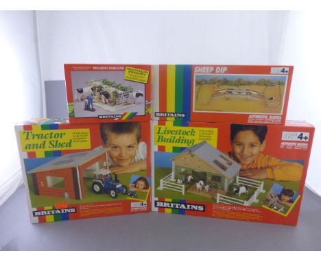 Four boxed Britains farming sets including 4721 Livestock Building, 4720 Tractor and Shed, 7160 Sheep Dip and 4710 Milking Pa