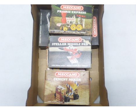 Six boxed Meccano Action Packs comprising of Star Striker, Prairie Express, Lunar Chariot, Stellar Missile Pad, Tractor and T
