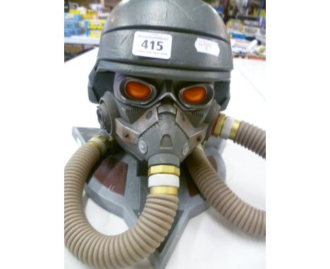 Gaming console storage helmet figure (?)