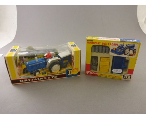 Boxed Britains 9527 Ford 5000 Tractor with standard safety cab steer-o-matic steering plus boxed Britains Farm Tractor Implem