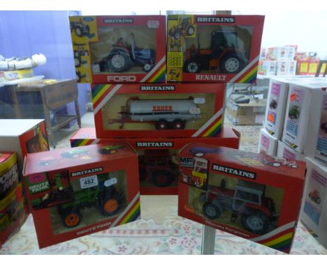 Six boxed Britains farming model vehicles including 9530 Deutz Eight-Wheeled Tractor, 9518 Renauklt Tractor, 9520 Massey Ferg