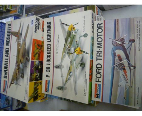 Five vintage Monogram 1:48 model kits including 6849 DeHavilland Mosquito, 6848 P-38 Lockheed Lightning, plus Monogram 1:72 5