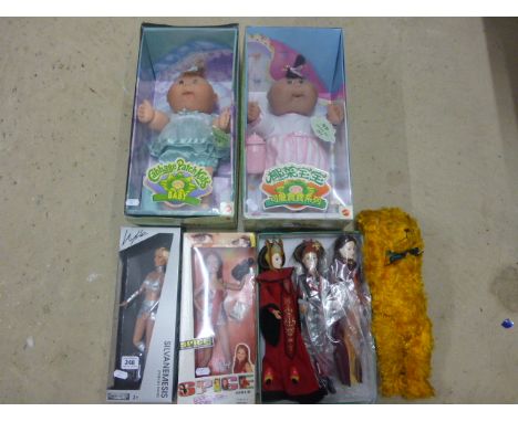 Mixed Lot comprising Two Boxed Cabbage Patch Dolls, Boxed Jakks Pacific Kylie Poseable Figure, Boxed Gerry Spice Girl, Straw-