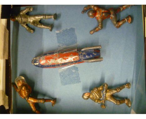 Four Cherilea Spacemen plus a rocket (one with helmet) play worn