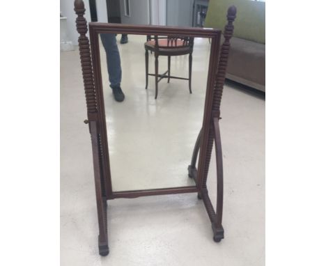 A bobbin-turned Cheval mirror