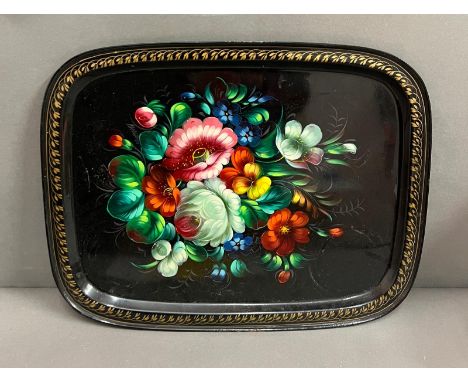 Vintage black enamel metal serving tray featuring vibrant hand painted floral bouquet in the centre, likely of Russian origin