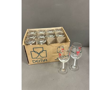A  selection of vintage Christmas holly wine glasses 