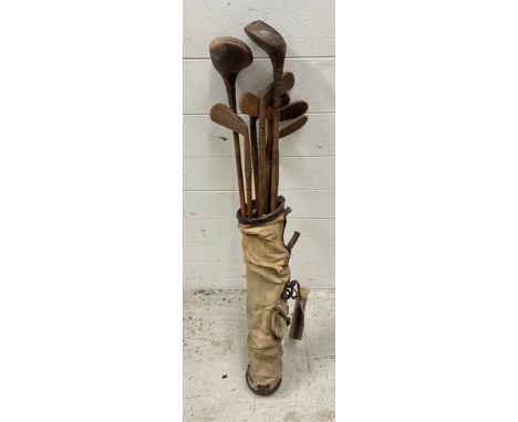 A vintage set of golf clubs 