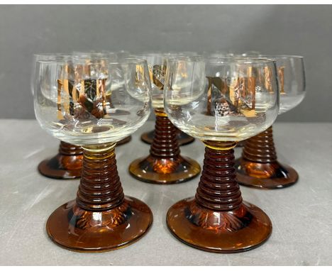 A set of eight vintage brown Stemme Napoleon Cognac glasses