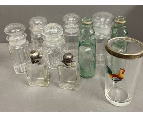 A collection of vintage glass, apothecary jars and bottles 