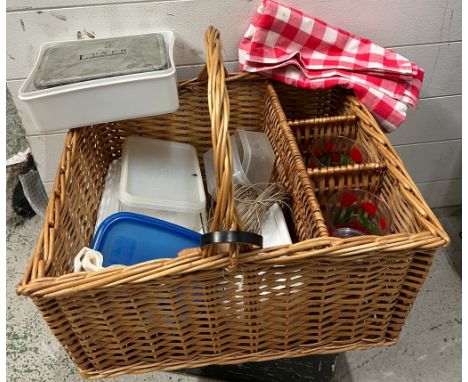 A vintage wicker picnic basket 