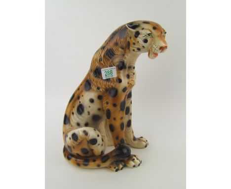 A large ceramic figure of leopard(paint chips to nose), height 36cm 