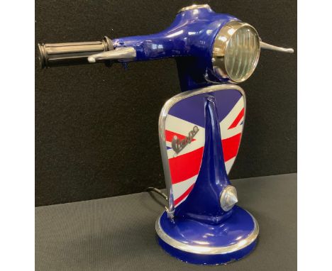 A novelty blue Vespa Scooter novelty table lamp, 33cm tall 