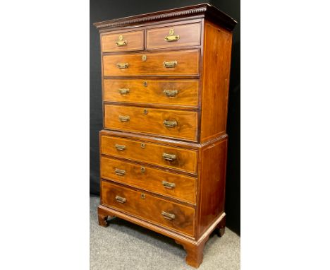 A George III style mahogany chest on chest, dentil cornice, top section with pair of short above three graduated drawers, thr