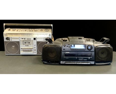 A retro 1980s Hitachi TRK-8290E Perdisco stereo radio cassette recorder/ Ghetto  Blaster, introduced 1981, with original inst