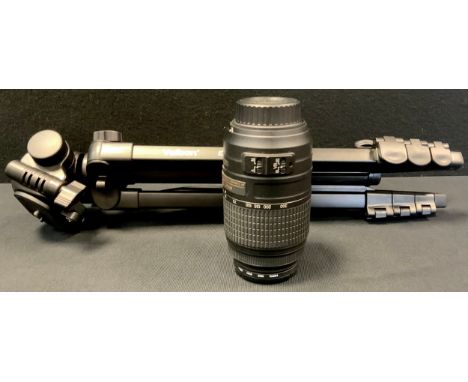 A Nikon AF-S DX Zoom-Nikkor 55-300mm f/4.5-5.6 G ED VR DX for digital zoom lens with soft case, instructions and original box