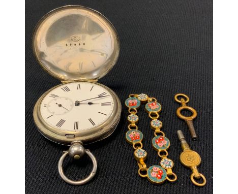 A continental silver hunter cased pocket watch, white enamel dial, bold Roman numerals, subsidiary seconds, key wind movement