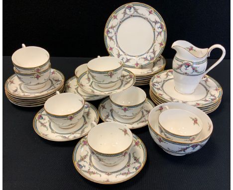 A Royal Worcester Rosemary pattern tea service for eight, pattern No.700518, printed marks 