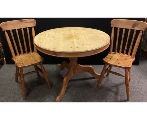 A mid 20th century pine kitchen tripod table, circular top, pedestal base, 74.5cm high x 107cm diameter;  and a pair of early