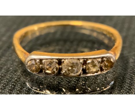 A diamond line ring, set with five old brilliant cut diamonds, total estimated diamond weight approx 0.20ct, unmarked gold co