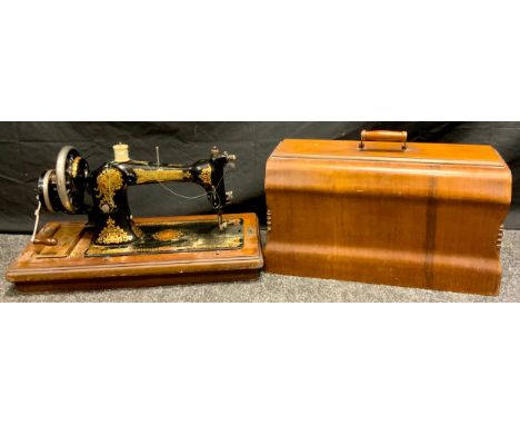 A Vintage Jones  portable hand operated sewing machine,  serial number 215913, cased 
