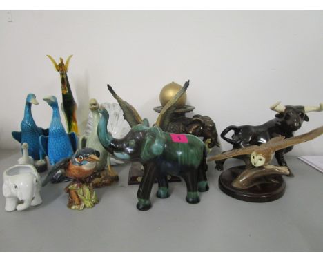 A collection of ceramic and glass animals to include a Beswick Kingfisher