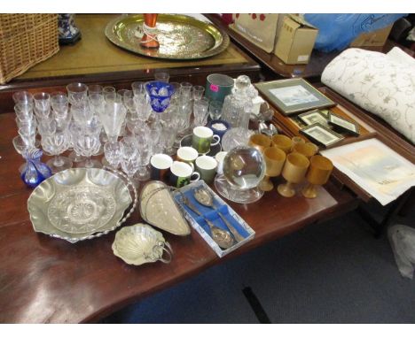 A large mixed lot to include glassware, a decanter, silver plate, prints, and a part Wedgwood coffee set