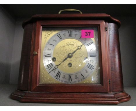 A Grapport reproduction mahogany cased mantel clock, the movement striking on a gong