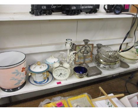 Silver plate, an enamelled clock, a table lamp, mixed china and a Victorian painted planter