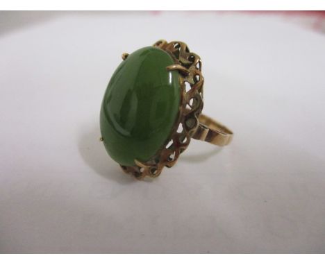 A 9ct gold and Jade dress ring