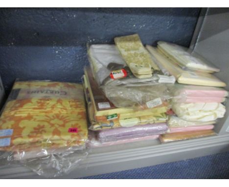 A quantity of new and packaged bedding and curtains to include Dorma