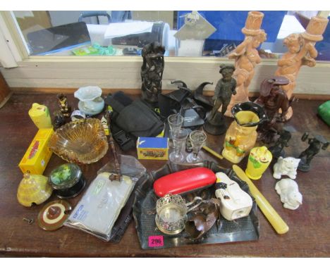 A mixed lot to include two patinated metal Oriental figures, a late Dinky Toys Ford Thunderbird, car model 555, a Swedish cor