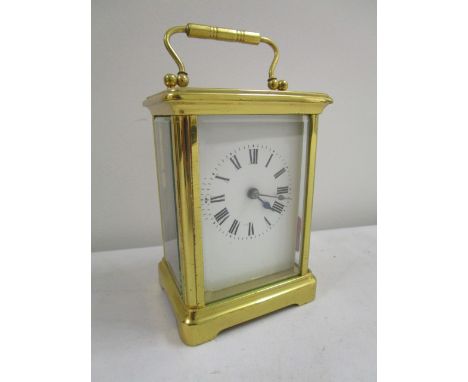 A French brass cased five-window carriage clock