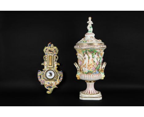 two pieces of ceramic with polychrome decor : a Rouen marked barometer and an Italian baroque style lidded vaseLot (2) faïenc