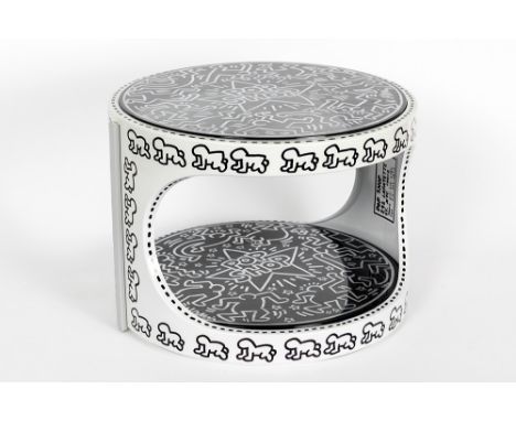 HARING KEITH (1958 - 1990)Keith Haring drawings on a seventies' occasional table with a design by Marc Held for 'Prisunic', c