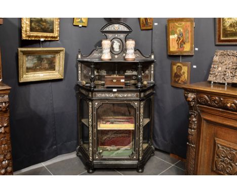 1st half of the 19th Cent. probably Italian Renaissance style display cabinet in ebony with inlaid motifs and with cabochons 