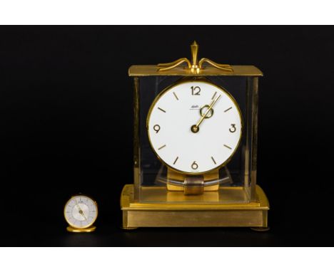 vintage table 'electronic' clock, marked Kundo & a "Jaeger (leCoultre)" marked travel alarm clockLot (2) met een vintage tafe