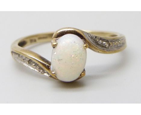 A 9ct gold, opal and diamond set ring, 1.7g, M