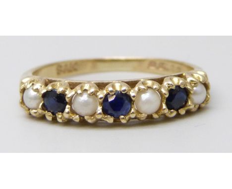 A 9ct gold ring set with pearls and sapphires, 2.2g, O
