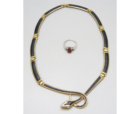 A silver ring set with a red stone, L/M (slightly misshapen) and a vintage leather style inlaid snake necklace