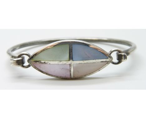A mother of pearl set silver bangle, 19g, 6 x 4.5cm