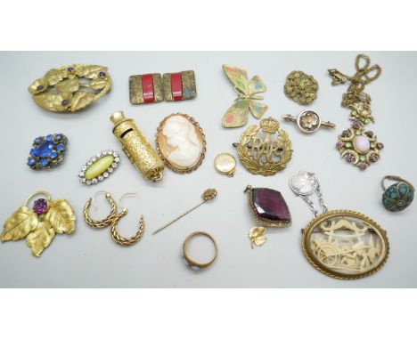 A collection of vintage jewellery including a French plastic brooch 