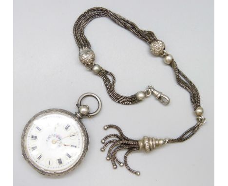 A lady's .935 silver fob watch with decorative enamel dial and an Albertina chain, 28cm