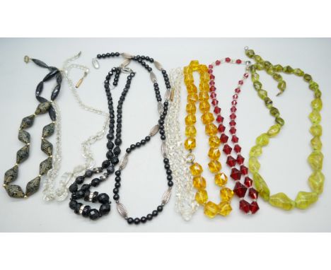 Vintage necklaces including two with silver clasps 