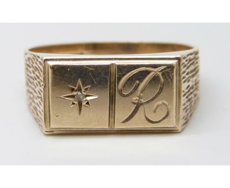 A 9ct gold ring with initial, set with a diamond, 5.3g, Z