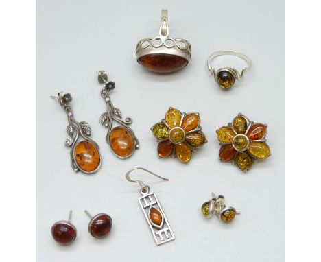 A collection of silver and amber set jewellery, the larger ring with foreign control marks, 29g